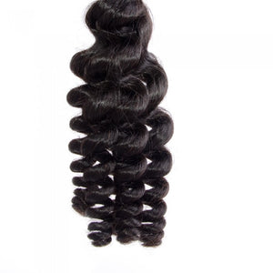 Virgin Funmi Egg curls Indian human hair. So soft and silky to touch.